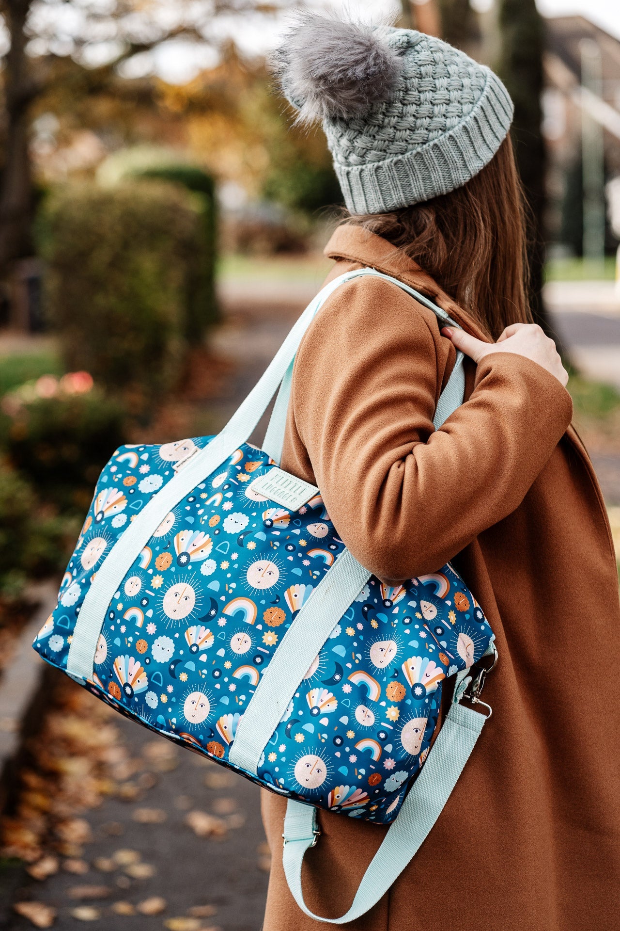 image of girl wearing patterned tote bag